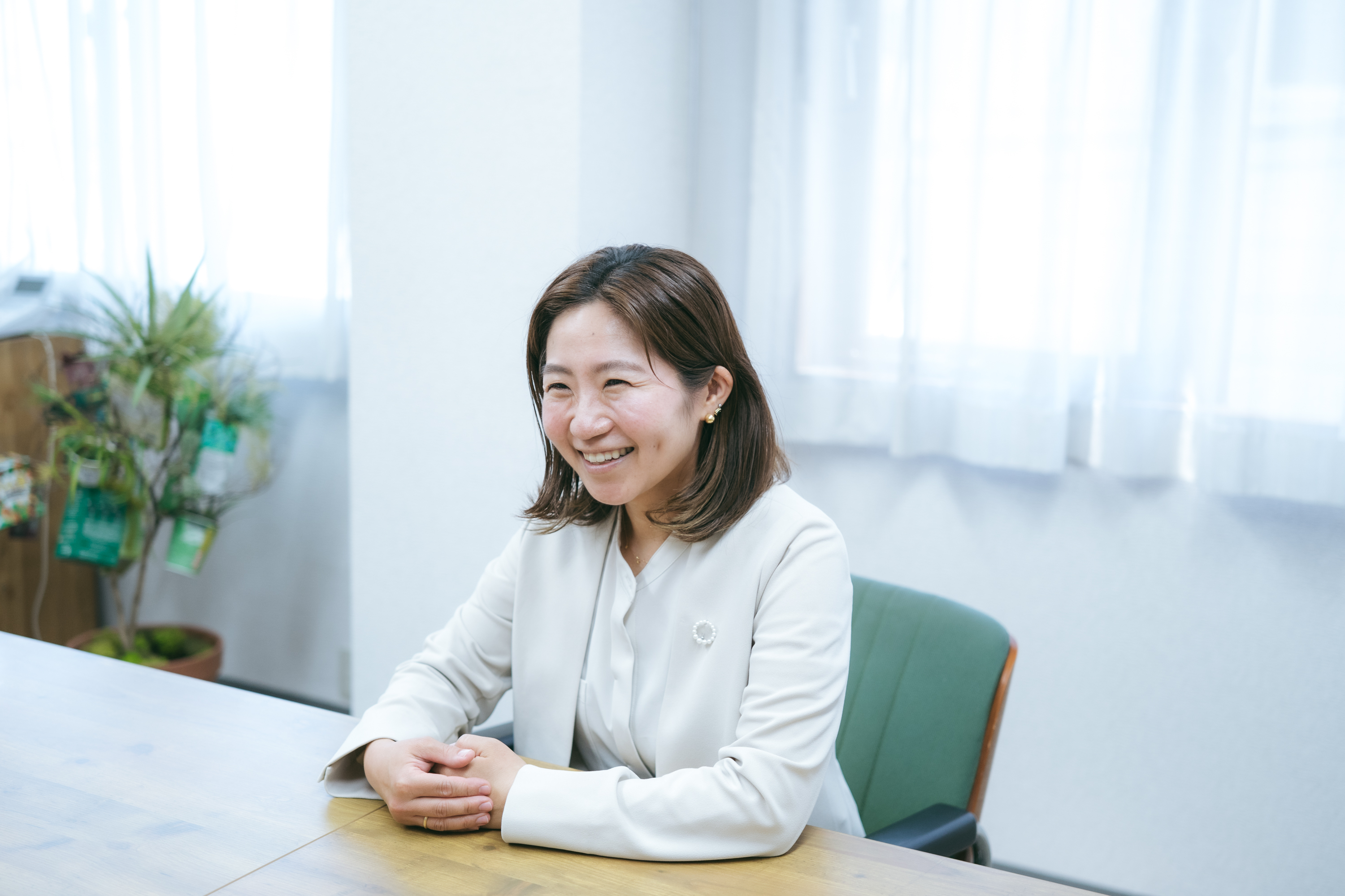 SHINAUN　代表取締役社長　毛塚久恵　笑顔